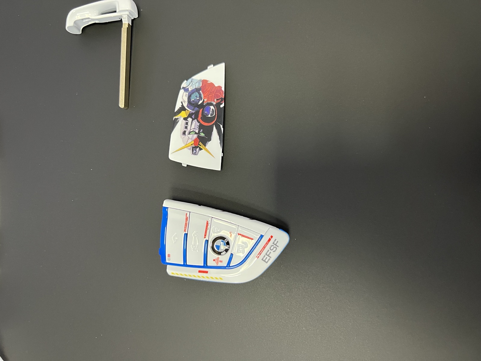 Custom painted key shell parts before final assembly